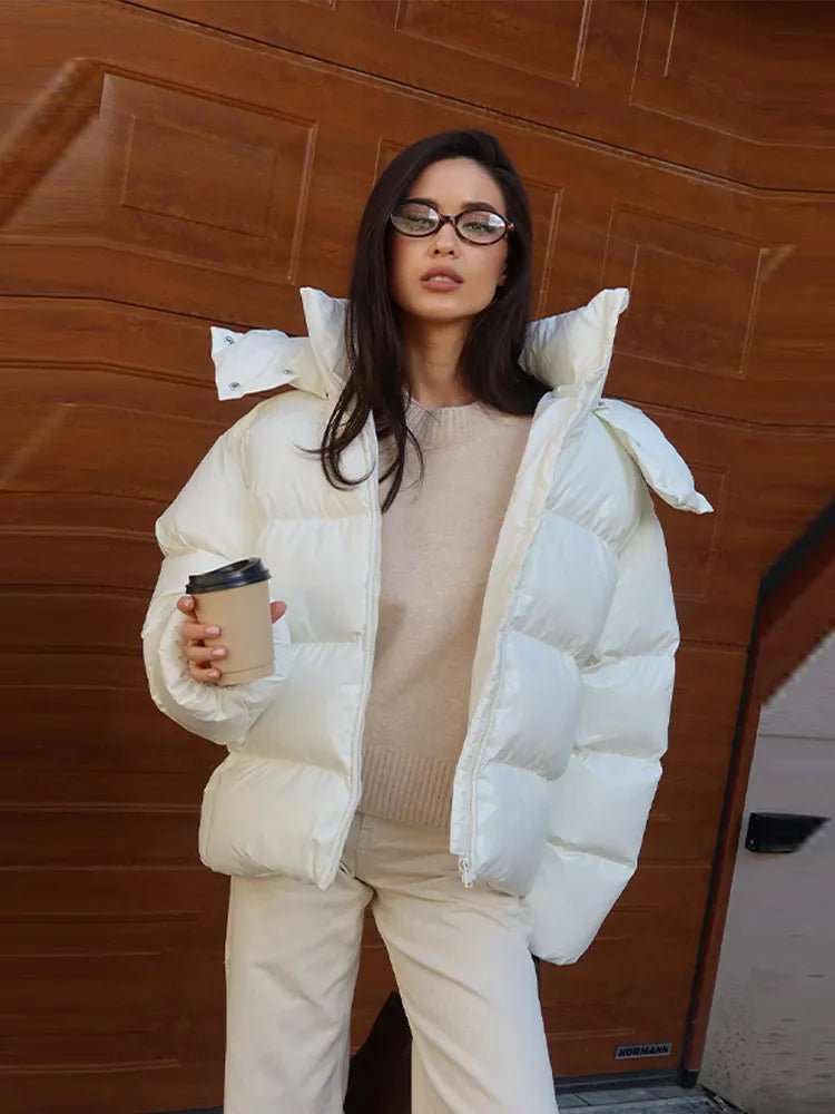 Glänzende Kapuzen-Pufferjacke