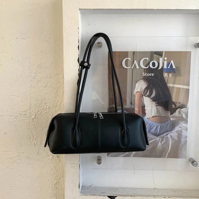 Zylindrische Kunstleder-Schultertasche im Vintage-Stil