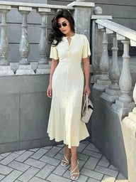 Robe midi en maille plissée Adelin, manches cloche