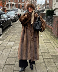 Long manteau élégant en fausse fourrure