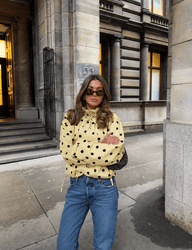 Veste à pois avec col montant et cordon