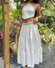 Set gonna a strati con top halter in pizzo