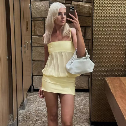 Abito aderente in mesh con spalle scoperte