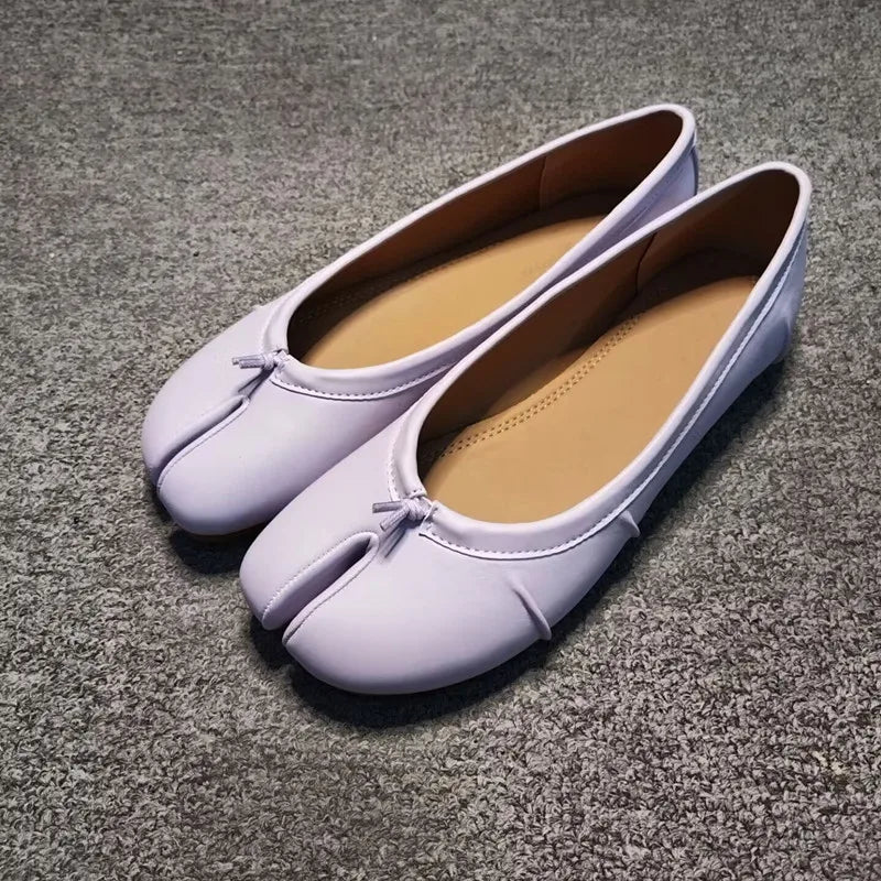 Mules in similpelle con punta divisa Laura